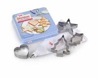 Boîte 4 découpoirs Noël + poche à douille + douille